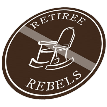 A circle with a brown background and a rocking chair in the center. A light white line crosses the circle making a version of the "NO" symbol. Across the top of the circle is the word "Retiree" with the word "Rebels" across the bottom.